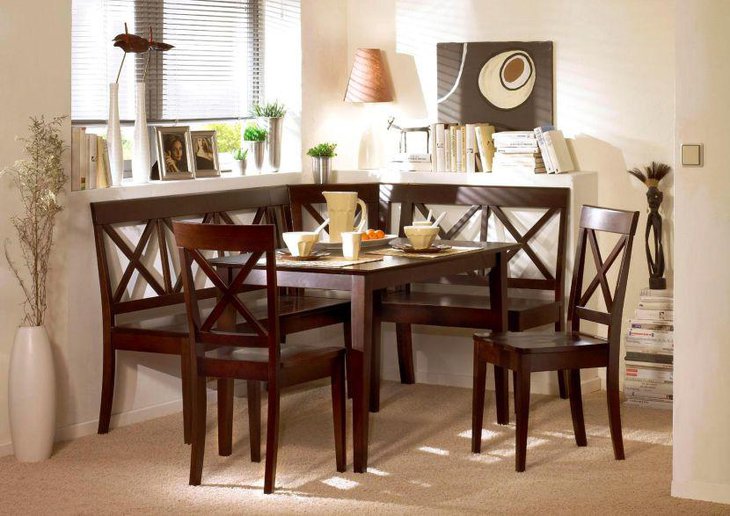 Breakfast nook with wooden furniture setting in natural light space