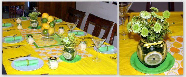 Bright yellow tablecloth green napkins and potted flowers for the centerpiece