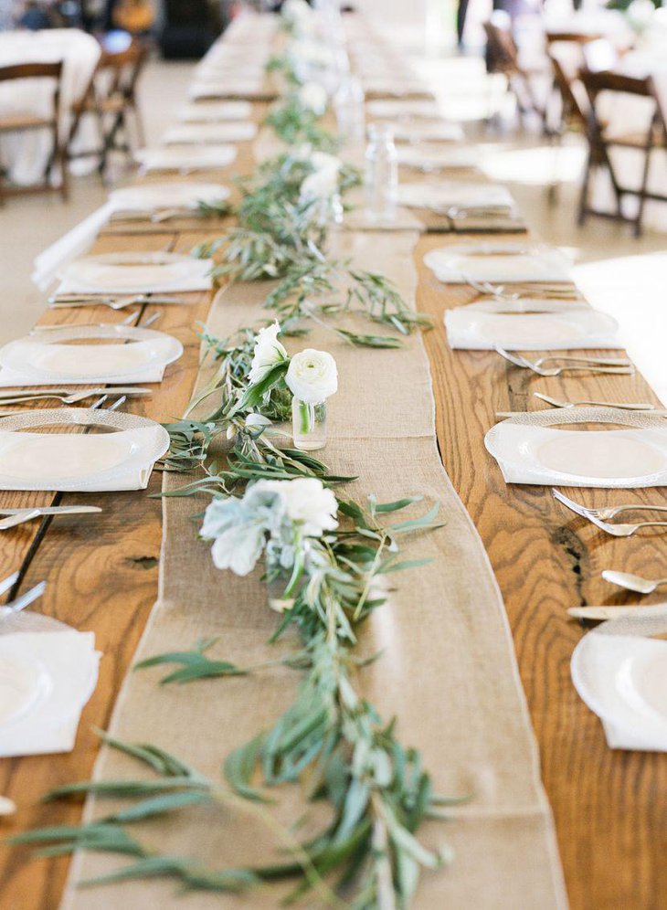 Burlap table runner looks romantic with natural elements