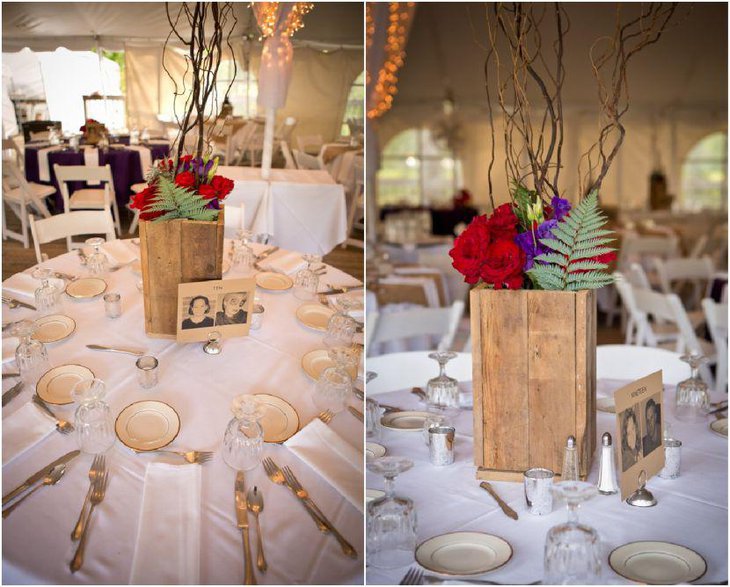 Charming country wedding recption table decor with wooden vase and picture