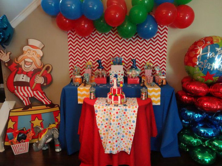 Cheerful circus carnival first birthday table decor