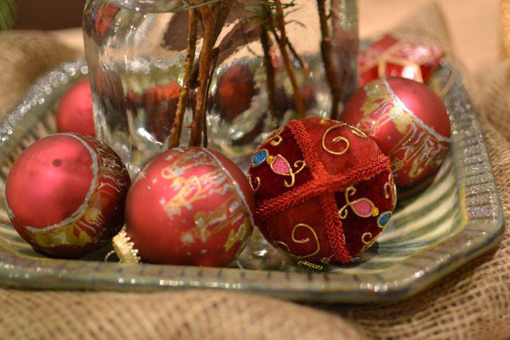 Christmas Table Setting With Red Shimmery Balls on Silver Tray