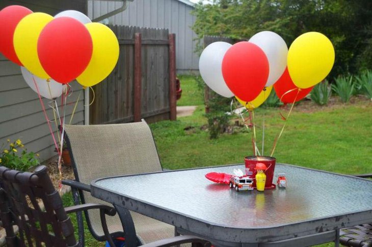 Colorful balloon decoration for summer garden party table