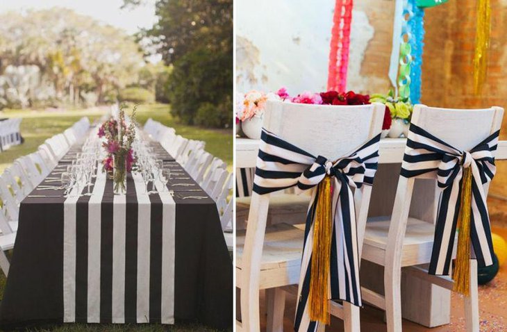Colourful floral centerpieces for black and white wedding tables