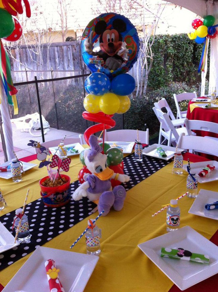 Colourful Mickey Mouse balloon birthday table centerpiece