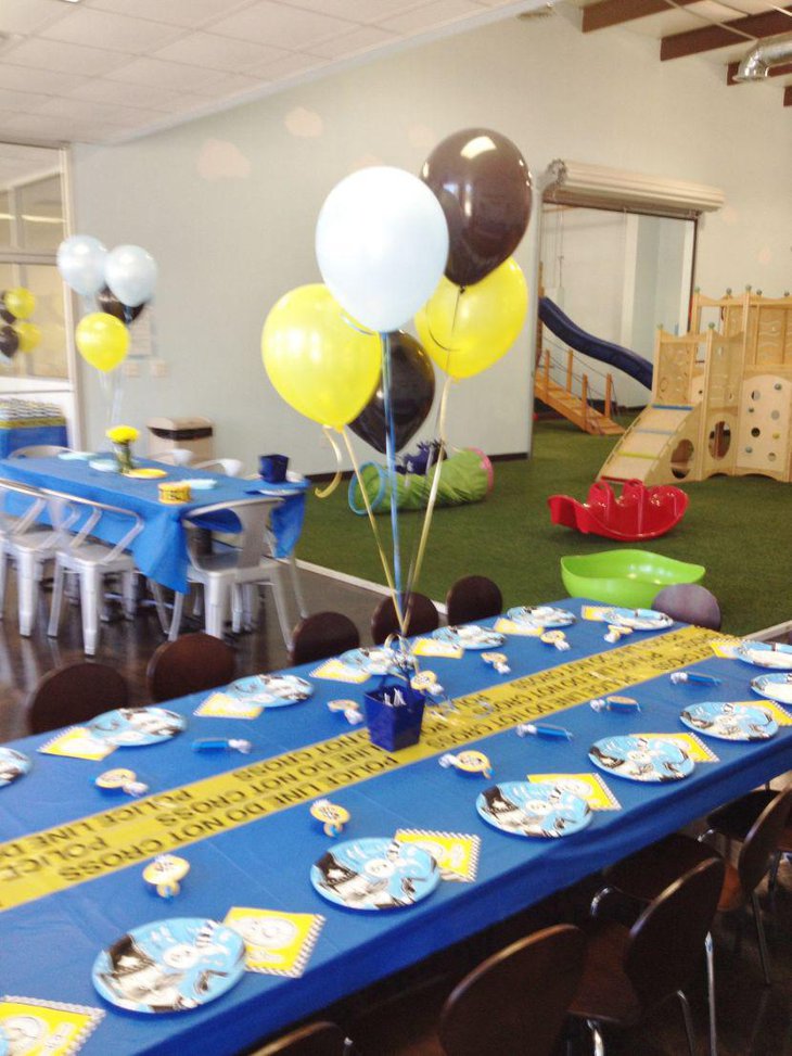 Colourful retirement party table decoration