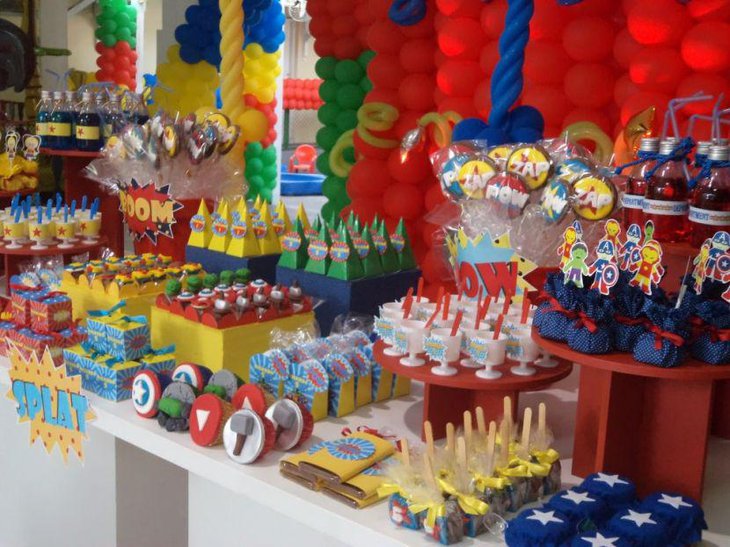 Colourfully decorated kids candy table with Avengers Theme