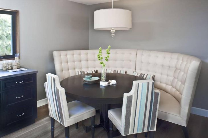 Cool Breakfast Nook With Curved Banquette Bench And Round Table