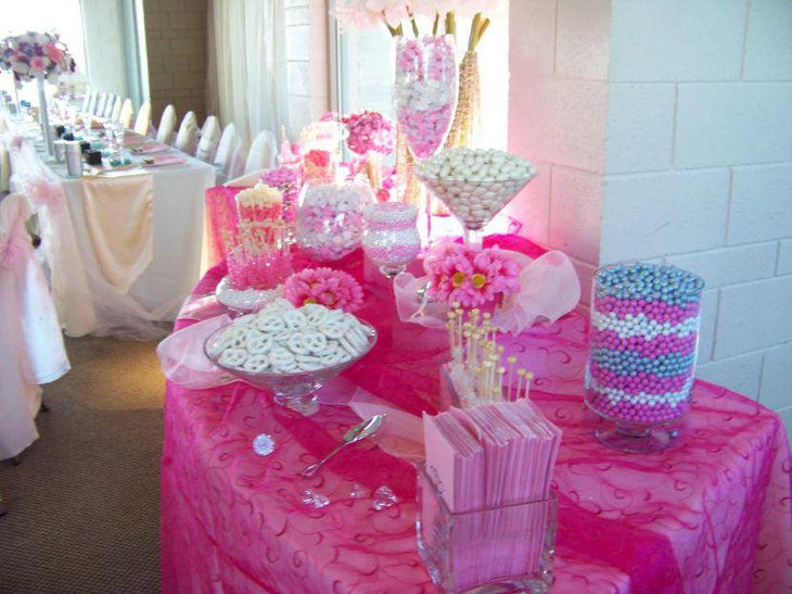 Cool pink baby shower candy table decor