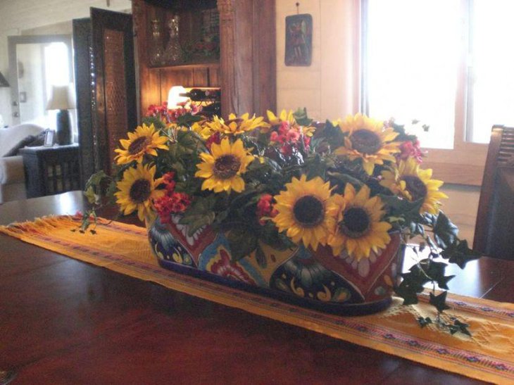Cute artificial sunflower centerpiece for dining table