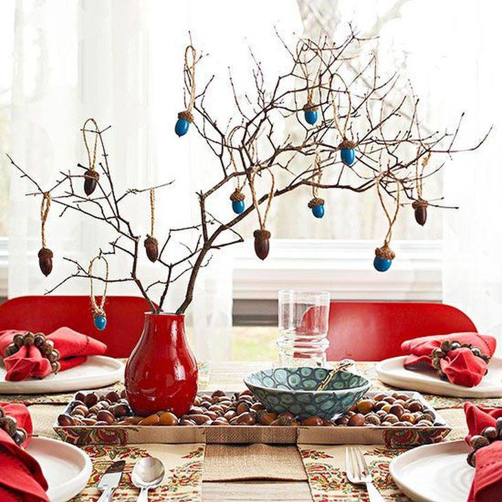 Cute DIY Acorn Branch Painted Table Centerpiece With a Red Vase