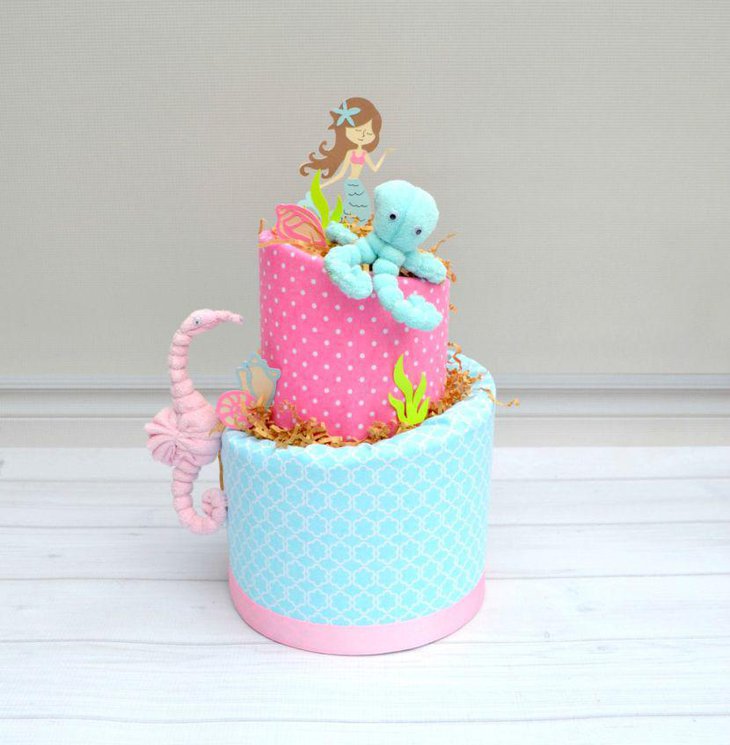 Cute DIY mermaid baby shower diaper cake centerpiece