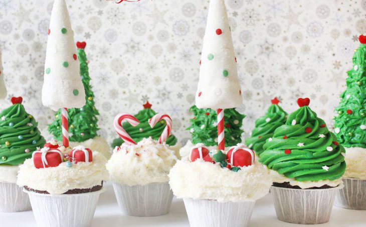 Cute green and white cupcake decor for kids Christmas dessert table