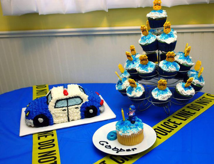Cute Lego police themed car cake and cupcake table decor