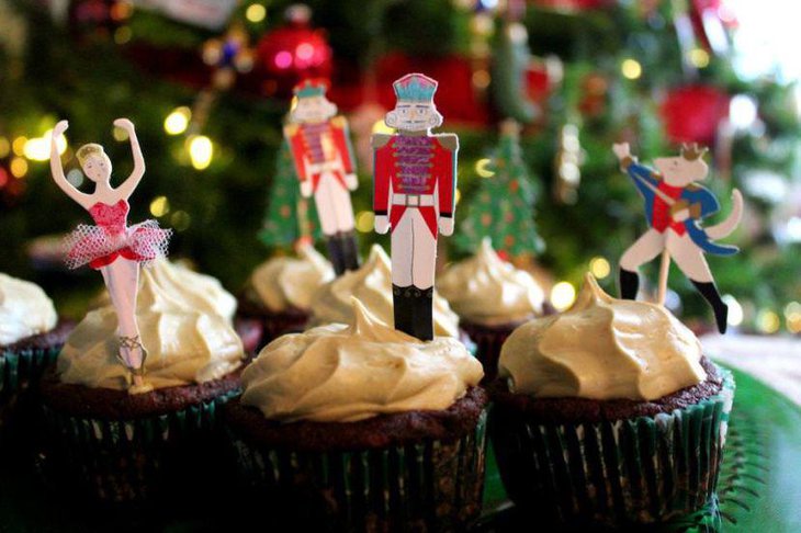 Cute nutcracker inspired cupcake decor for Christmas dessert table