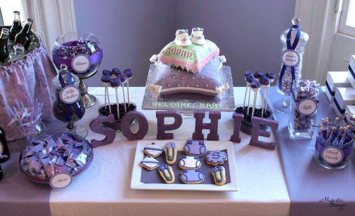 Cute purple themed girl baby shower candy table decor