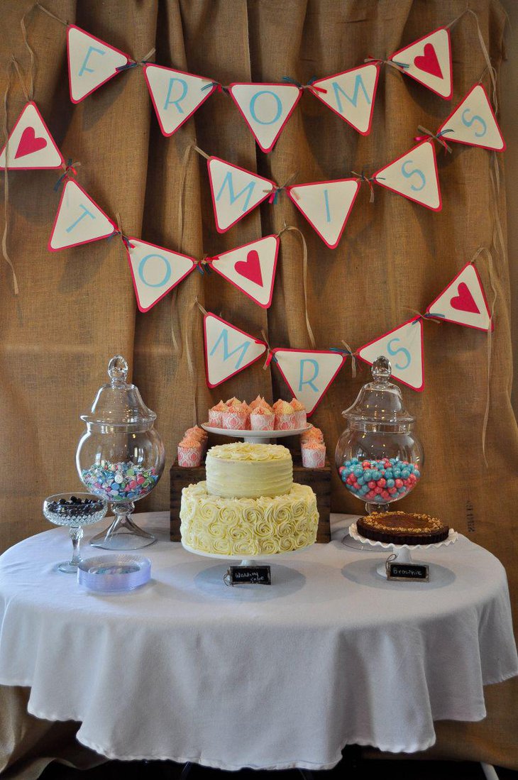 Cute shabby chic bridal shower dessert table decor with brown hues