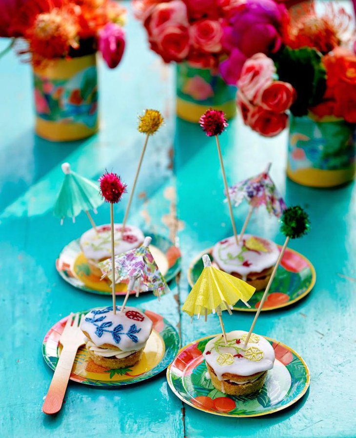 Cute umbrella decorations on summer birthday table