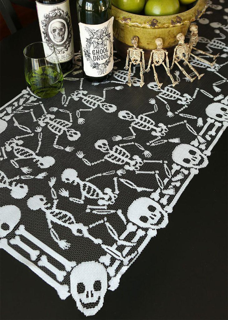 Dancing skeletons seen on this table runner