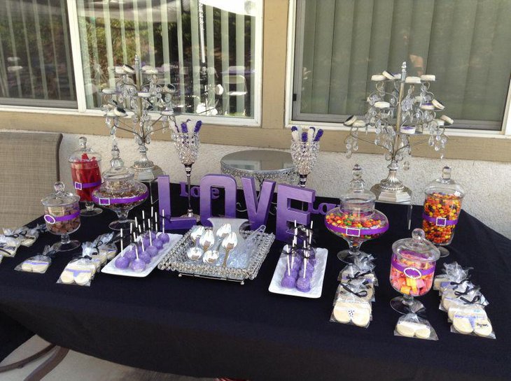 Delightful purple accented wedding candy table