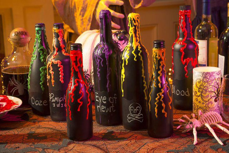 DIY black lab bottles diplayed on Halloween table