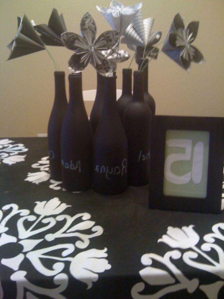 DIY Chalkboard Wine Bottle Centerpieces With Paper Flowers