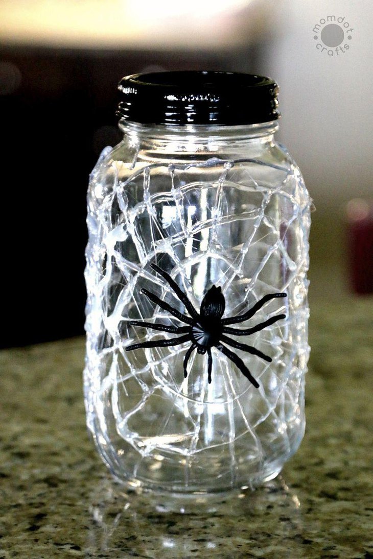 DIY spiderweb mason jar decor