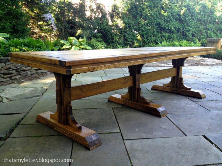 DIY triple pedestal dining table with curved arches on the pedestal