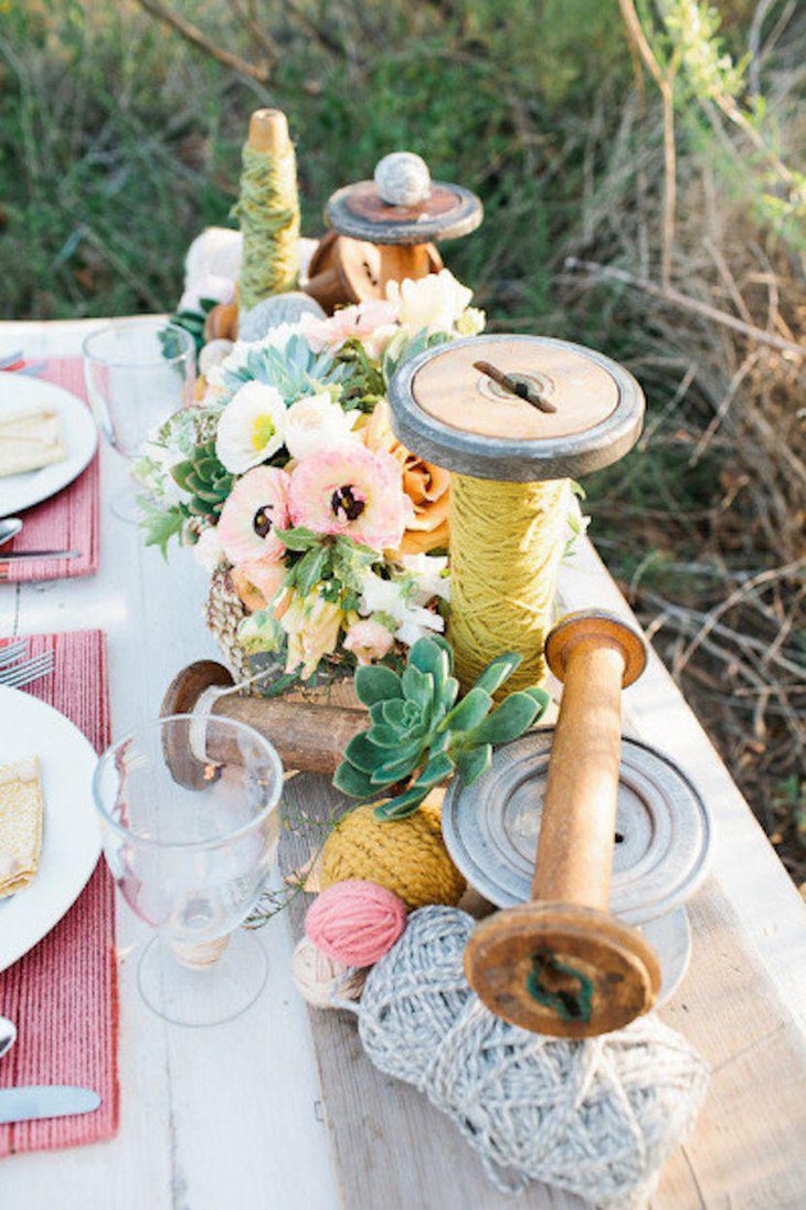 DIY Wooden Spool With Yarn Balls As Wedding Table Centerpiece