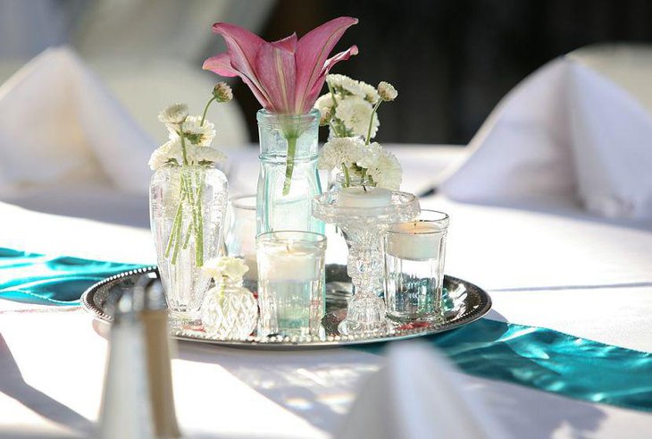 Elegant vintage vignette centerpiece on wedding table
