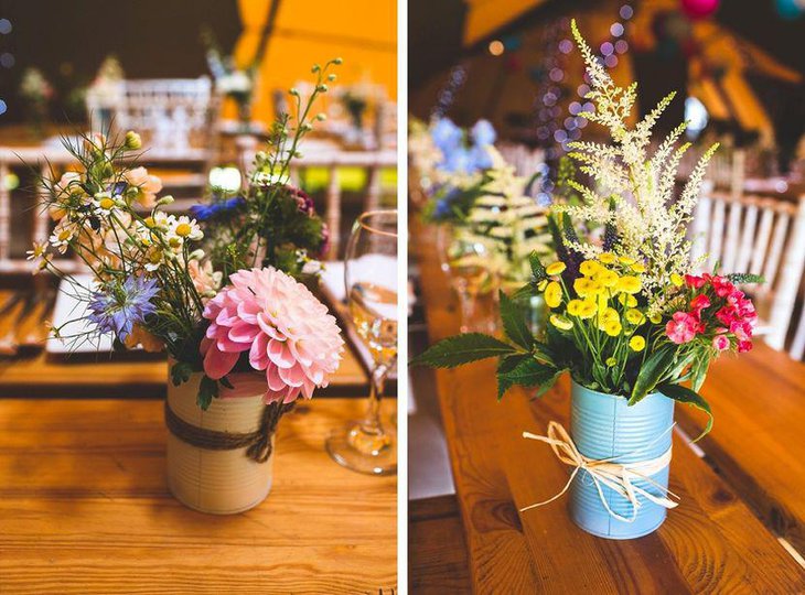 Elegant wedding table decor with vintage tins