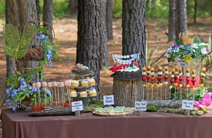 Enchanted fairy birthday party table for spring