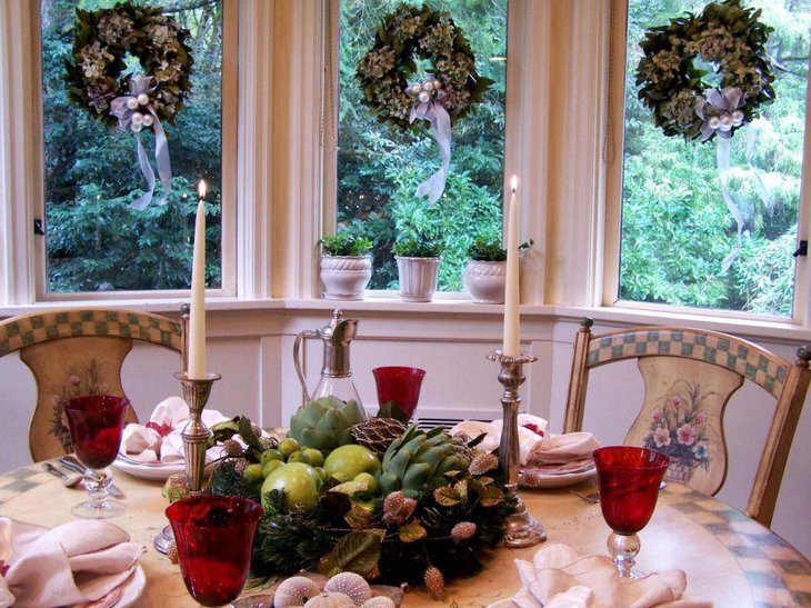 Engaging dining table decor with a basket full of fruits as centerpiece