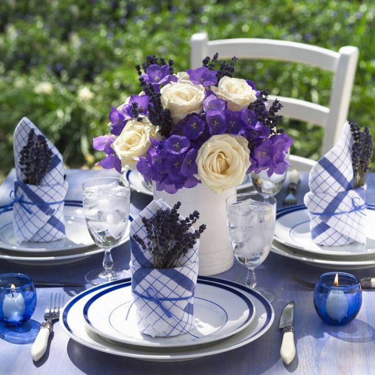 Extravagant purple and white floral centerpiece idea