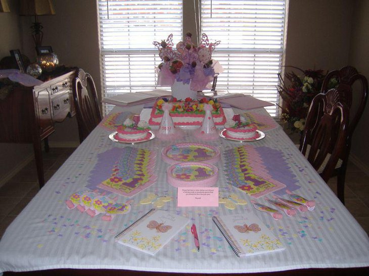 Feminine butterfly decor on summer birthday table