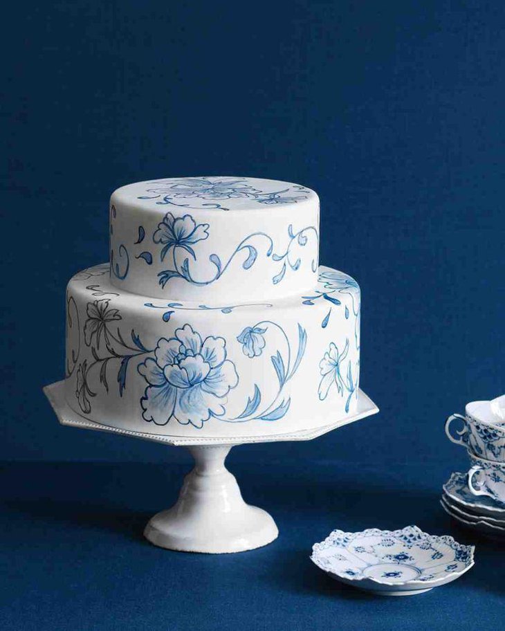 Floral cake decor in blue and white on bridal shower dessert table