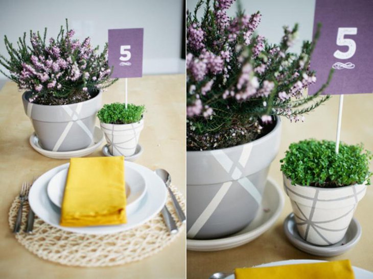 flower pots paired with a pop of color in the napkins