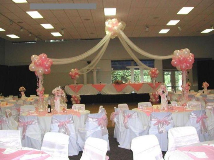 Flowers and balloons are decking up these cute sweet 16 birthday tables