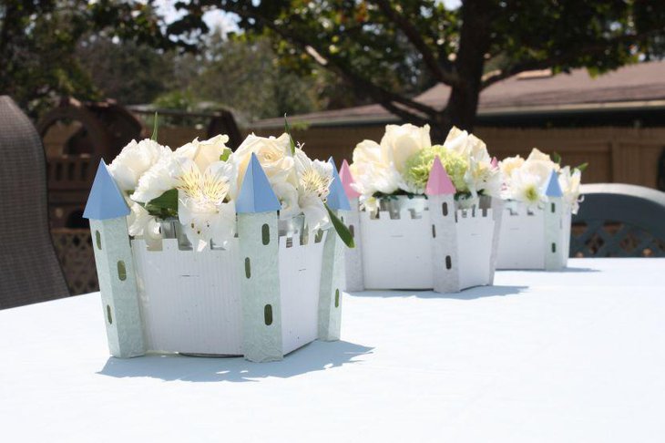 Flowers in a castle arrangement for princess baby shower