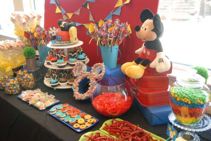 Fun Mickey Mouse inspired birthday sweets table