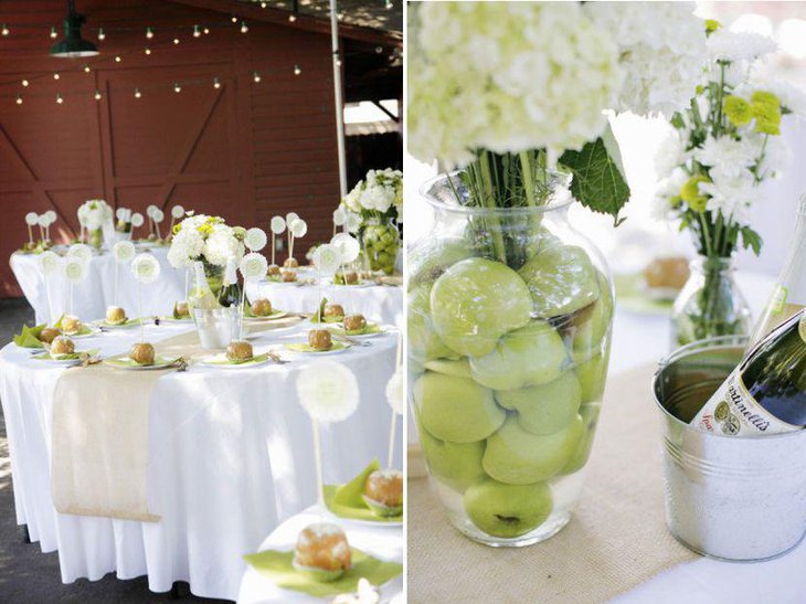 Glass jar filled with fruits as summer wedding table centerpiece