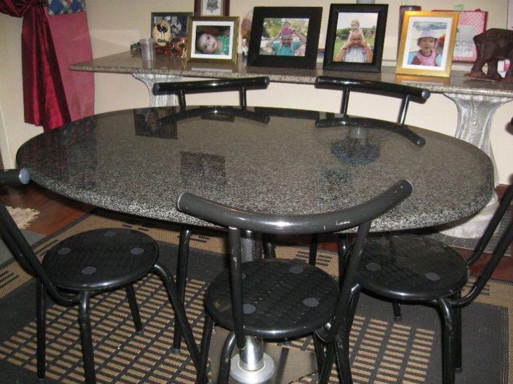 Glossy round granite dining table