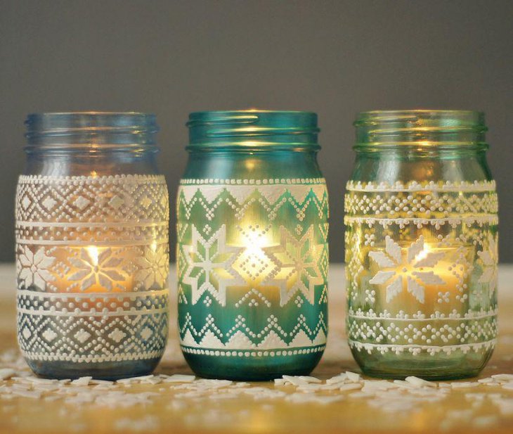 Glowing candles decorated in laced mason jars for baby shower 1