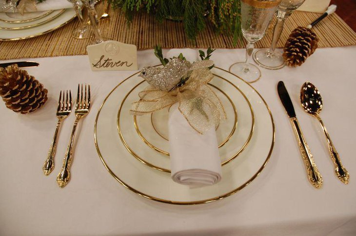 Gold cutlery decor on dinner table