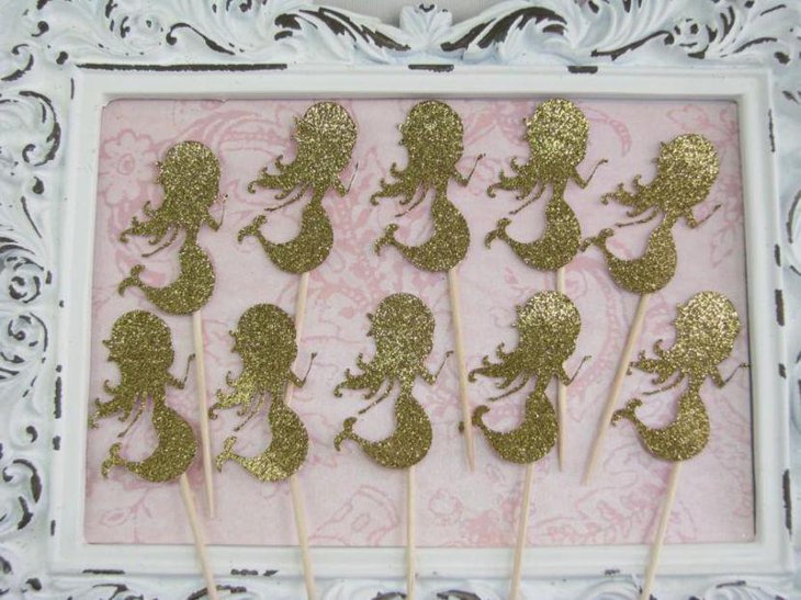 Golden DIY mermaid cupcake toppers for baby shower
