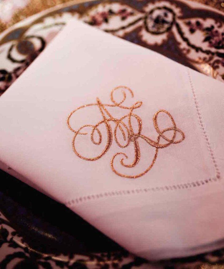 Golden monogram embroidered dinner napkin