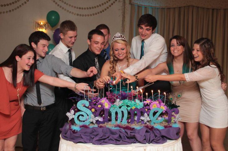 Gorgeous blue and purple decor on sweet 16 birthday table