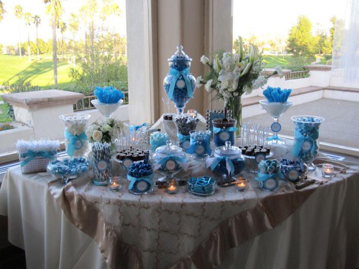 Gorgeous blue DIY wedding candy table decor