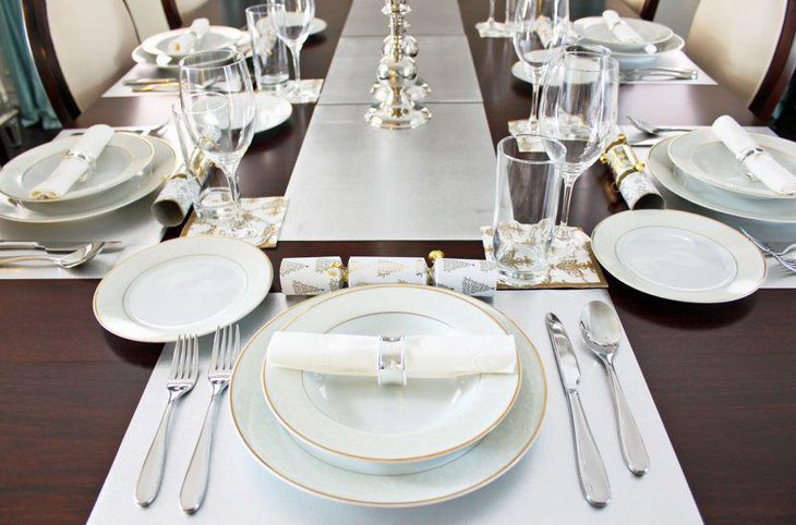 Gorgeous dinner tablescape with silver accents