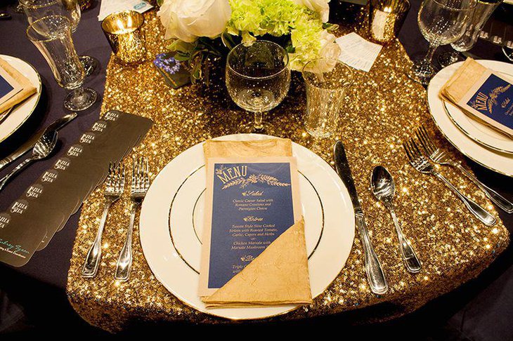 Gorgeous golden accented menu card on wedding table